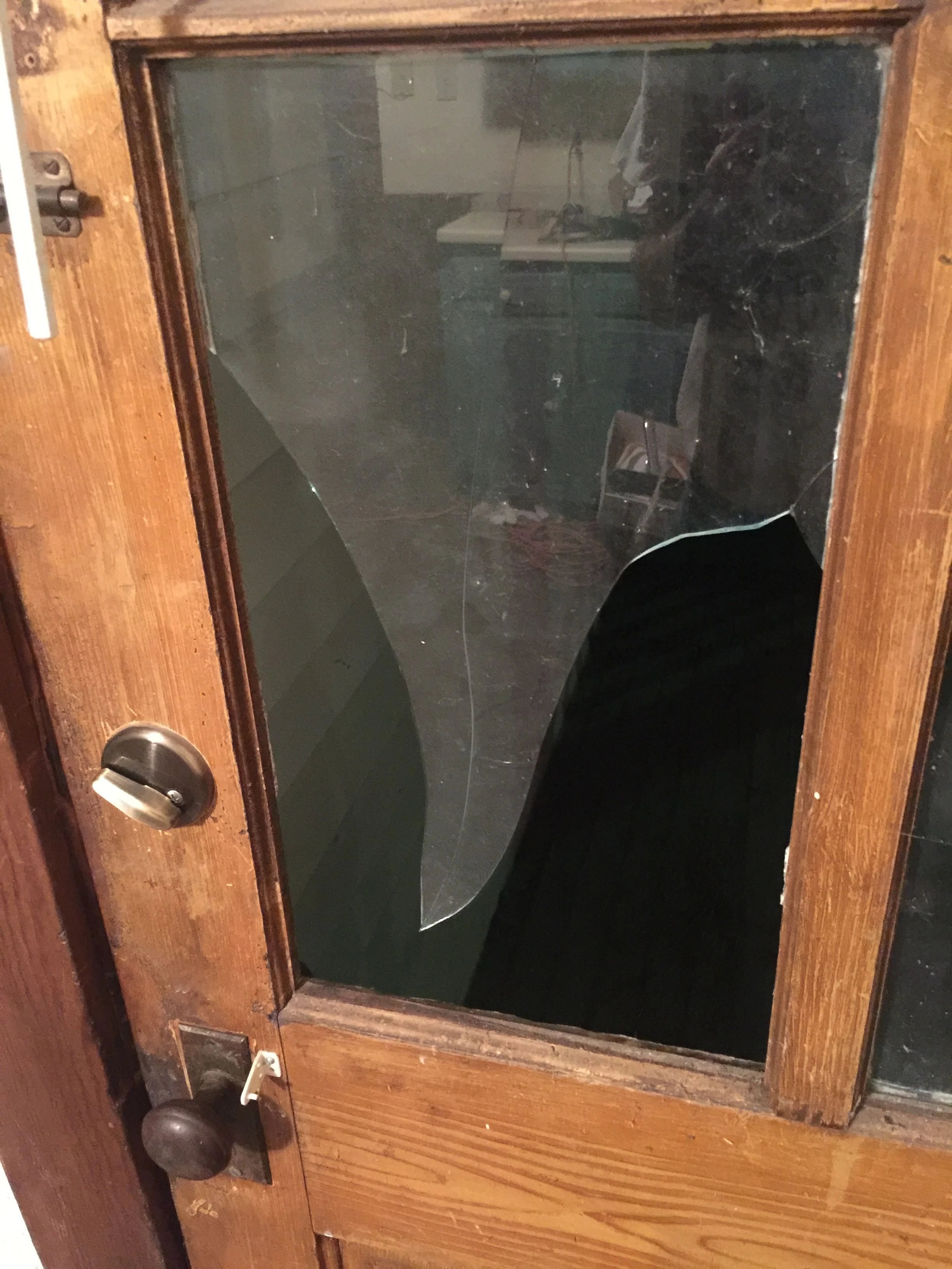 Broken window. Now there are double dead bolts on both doors. Like that will help.