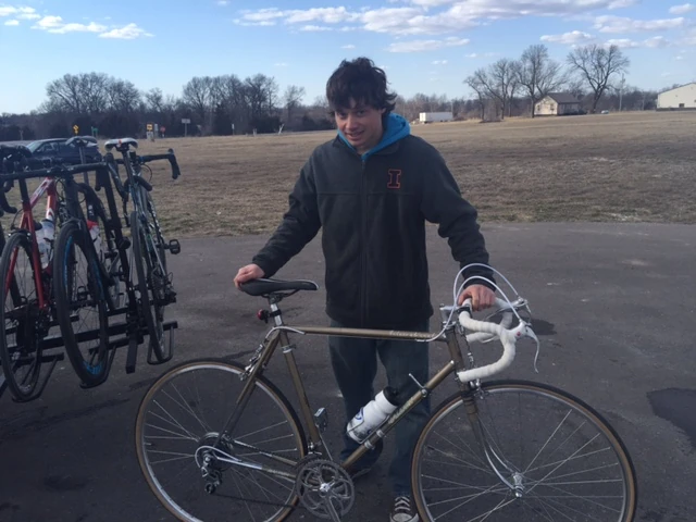This is a kid that went to University of Illinois. He name is Michael I think. I believe he rode the Cat 5 race. On this. Crazy. It was really 5 gears in the back. He said he was going to get it repainted, but I told him to leave it original. A 1974 Raleigh International really is a beautiful machine. Kickstand and all.
