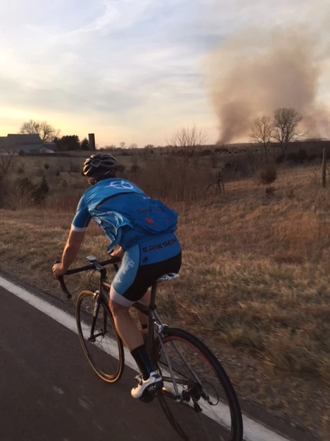 Bill checking out a new blaze. Perfect weather conditions for burning.