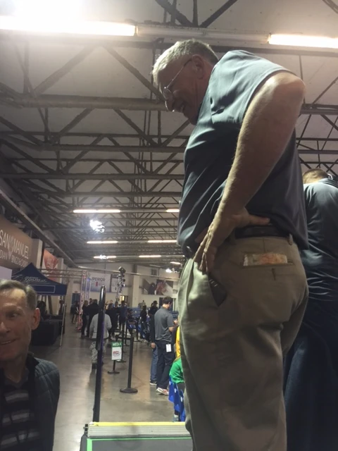 Brian Drebber taking a second from announcing to say hi. Wayne Stetina below.