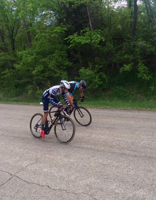 Benn and Dylan sprinting uphill. The line is still 200 meters up.