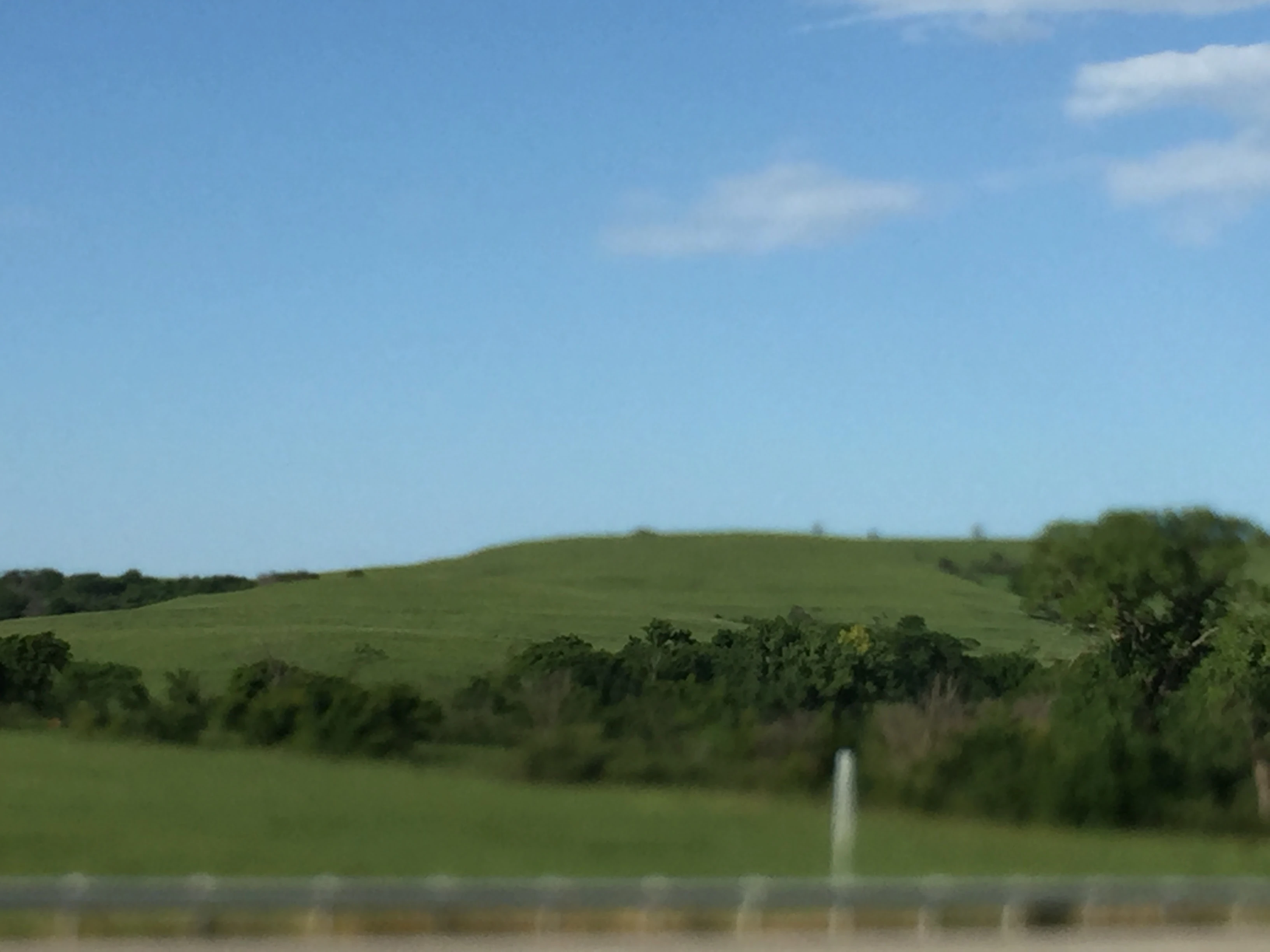 The Flint Hills are still green. 