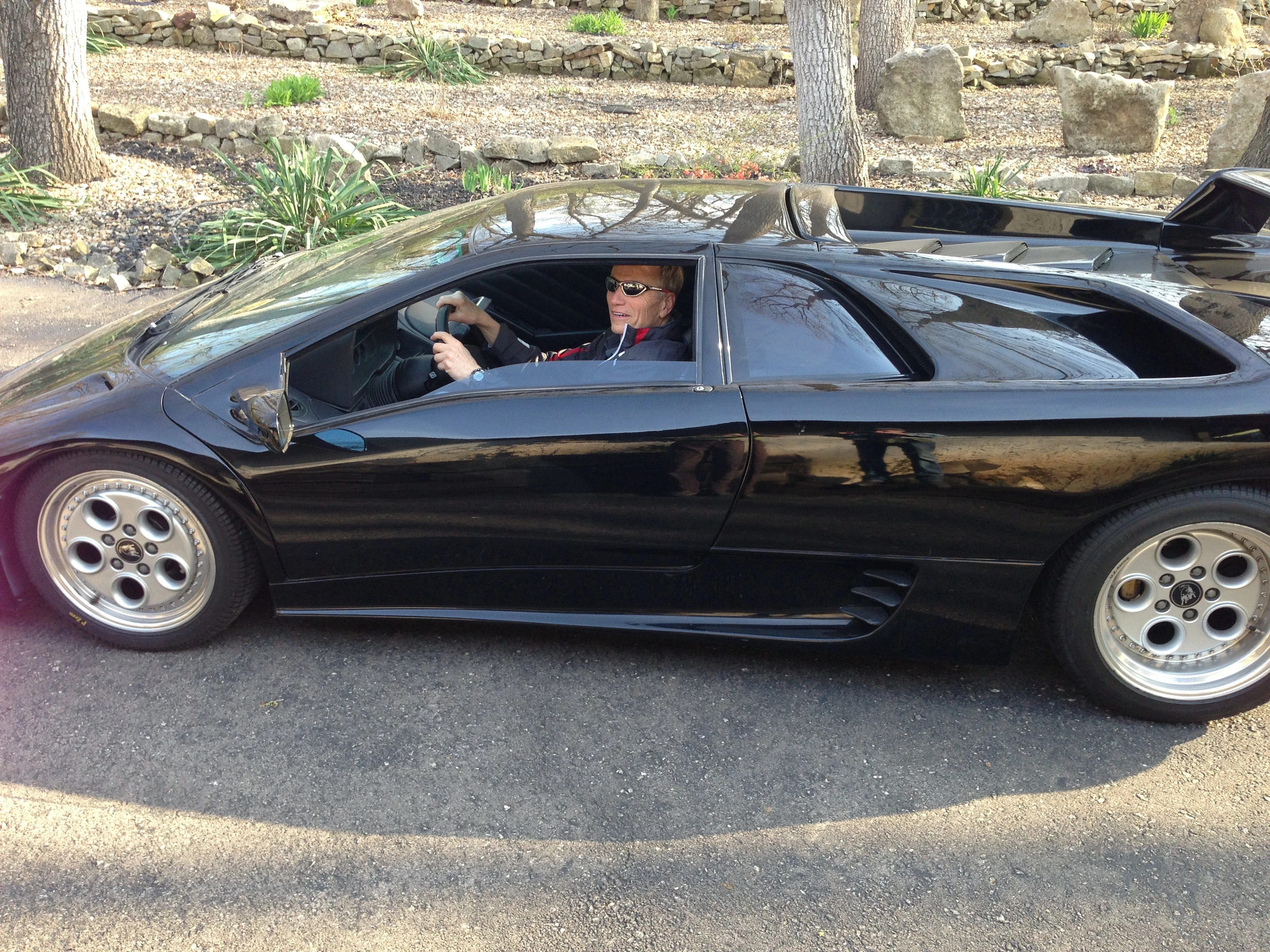 This is Dennis about ready to take Vincen&rsquo;ts dad&rsquo;s Lamborghini Diablo out for a spin. You need a very strong left leg if you&rsquo;re going to drive this car, the clutch is killer.
