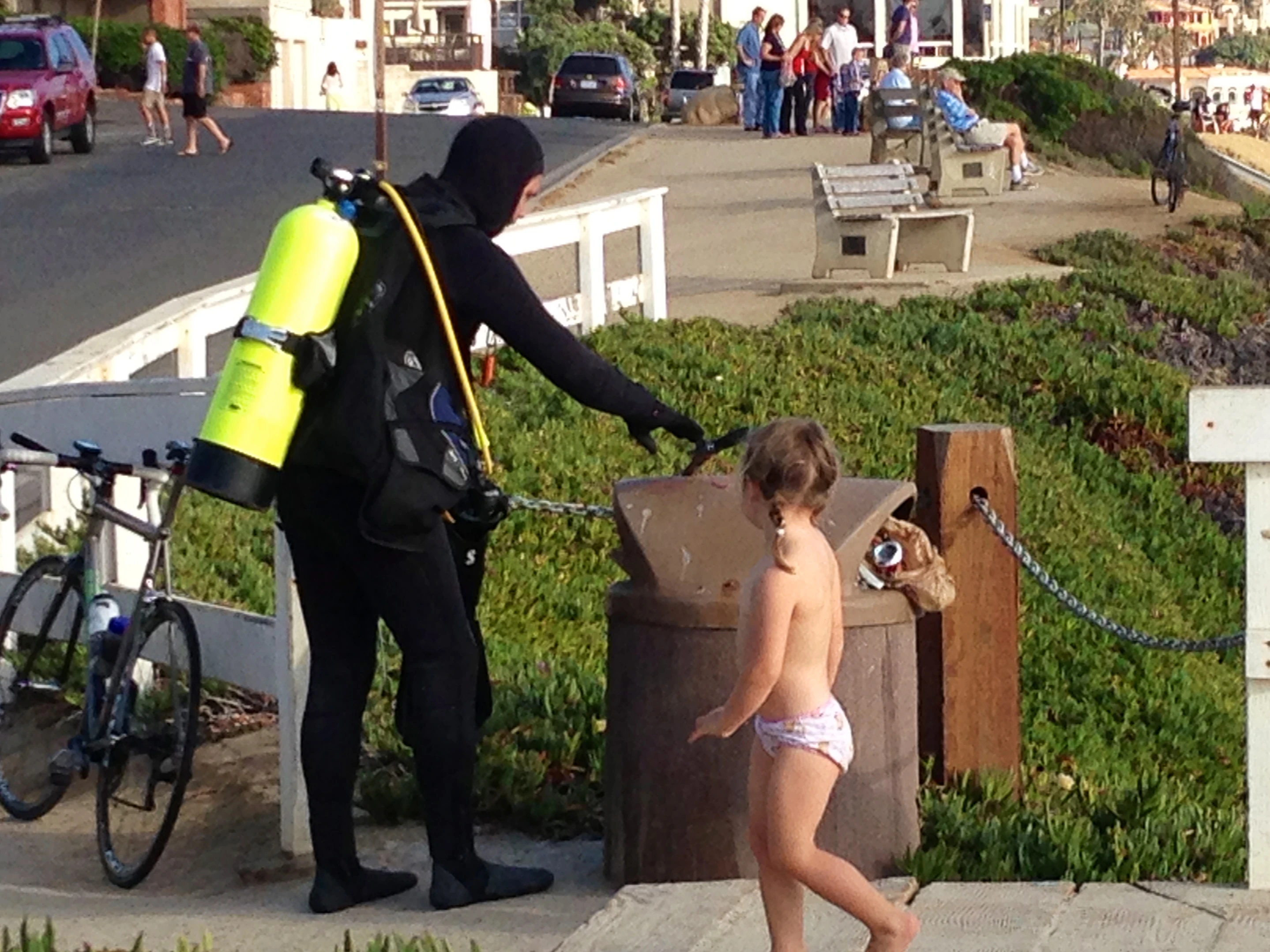 I was riding by the cove and this guy was about to head in to dive. He must have looked strange to all of us.