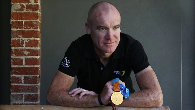 And proudly showing his Olympic Gold medal.