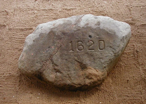 Plymouth rock. I think it has been whittled down through the years. It is only a few feet across.