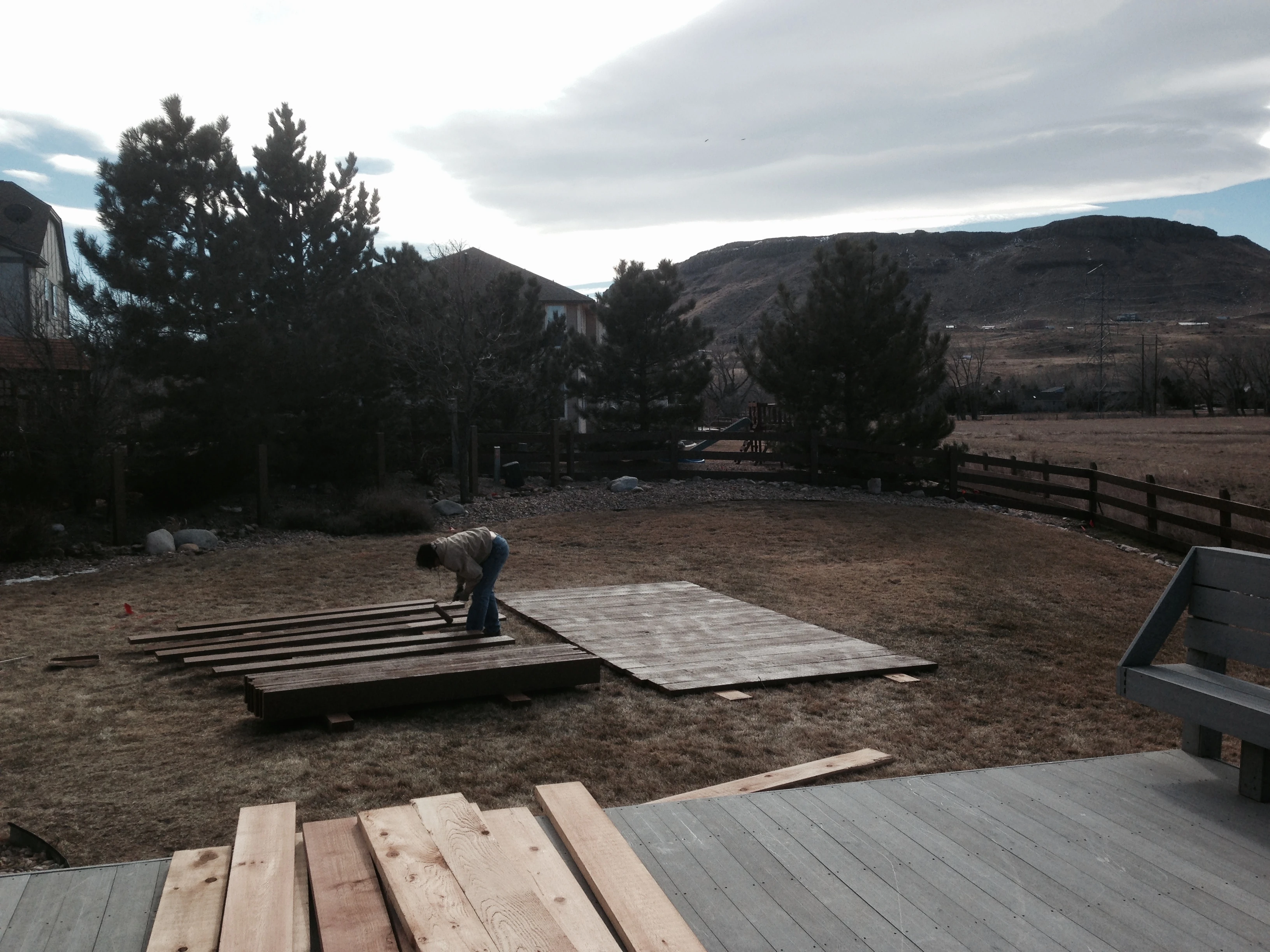 Trudi staining the rails before right before the crazy winds started.