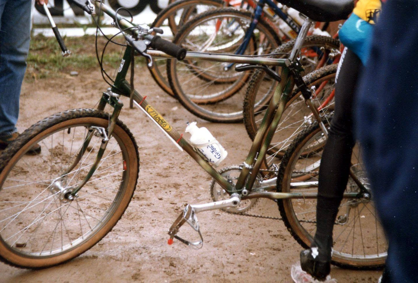 Alexi’s skinny legs at the start, along with his camo Moots bicycle.
