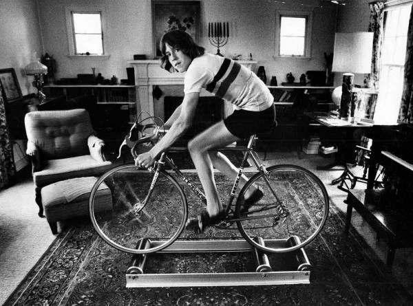 Photo from a newspaper article of me riding rollers with a broken collarbone before Nationals.