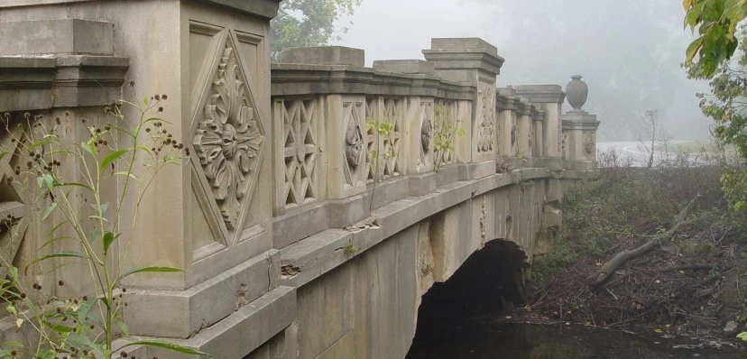 The park is beautiful with a few old bridges.