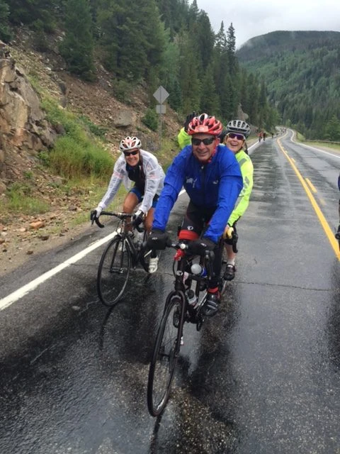 Sue, Bill and Laura climbin up towards Minturn in the rain.