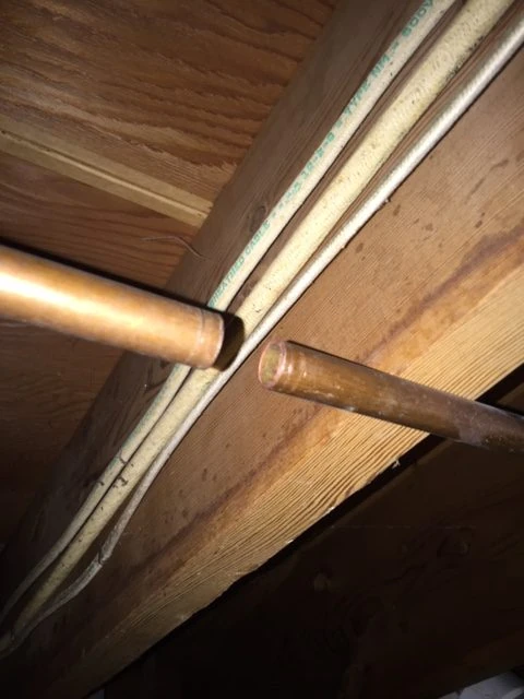 Just cut the old plunger thing out of the copper cold water pipe.